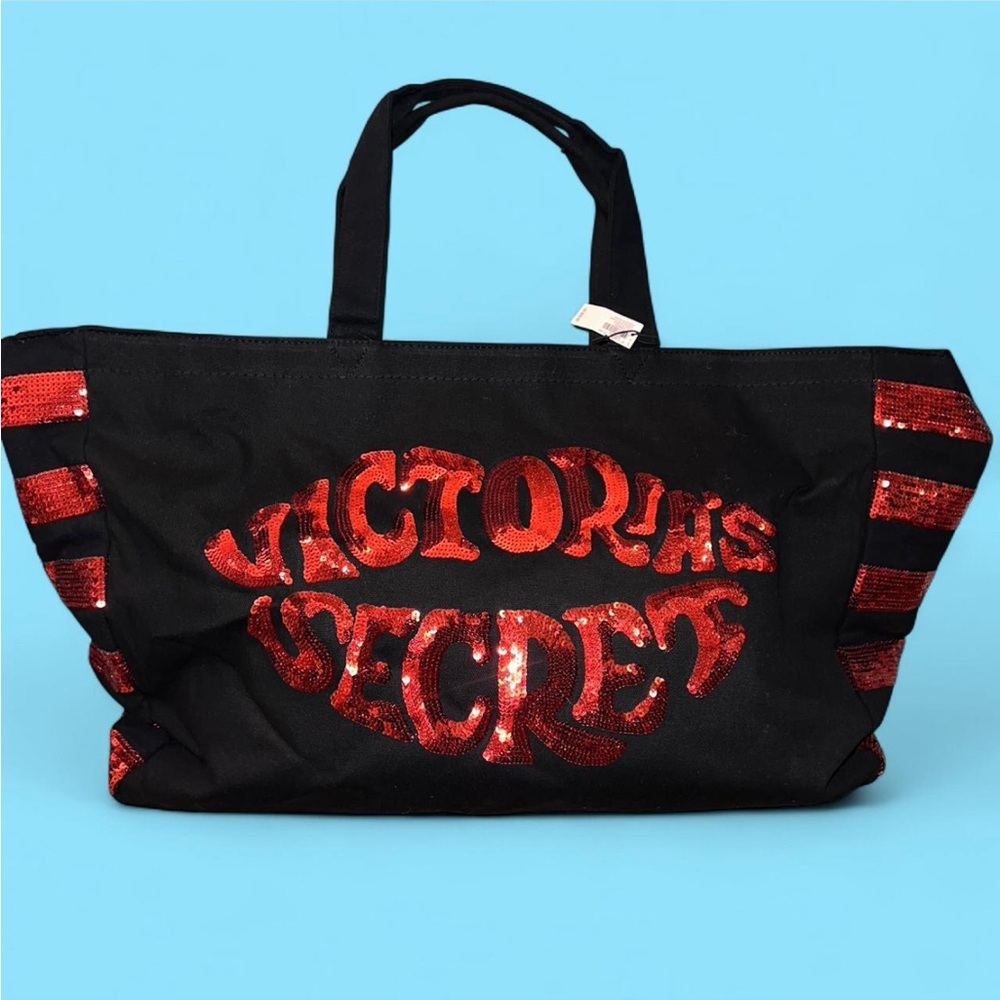 Free w/ $55 Purchase 
Victoria’s Secret Duffle Bag Black w/ Red Sequin
